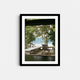 A framed fine art photography print featuring a view looking out of a house towards the Hudson River in New York.