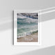 A framed fine art photography print featuring clear blue ocean waves in Laguna Beach, California.