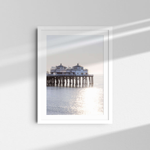 A framed fine art photography print featuring the Malibu Pier in California.