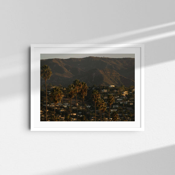 A framed fine art photography print featuring a mountains and palm trees landscape in Santa Barbara, California.